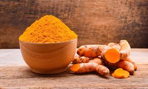 Bowl of vibrant turmeric powder highlighting its health benefits for your daily routine