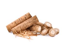 Whole and grated Horseradish root showcasing the health benefits of Burdock Root.