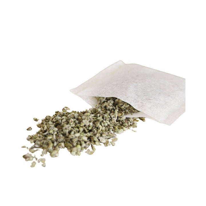 Dried green herbs from a packet promoting yerba mate for heart health support